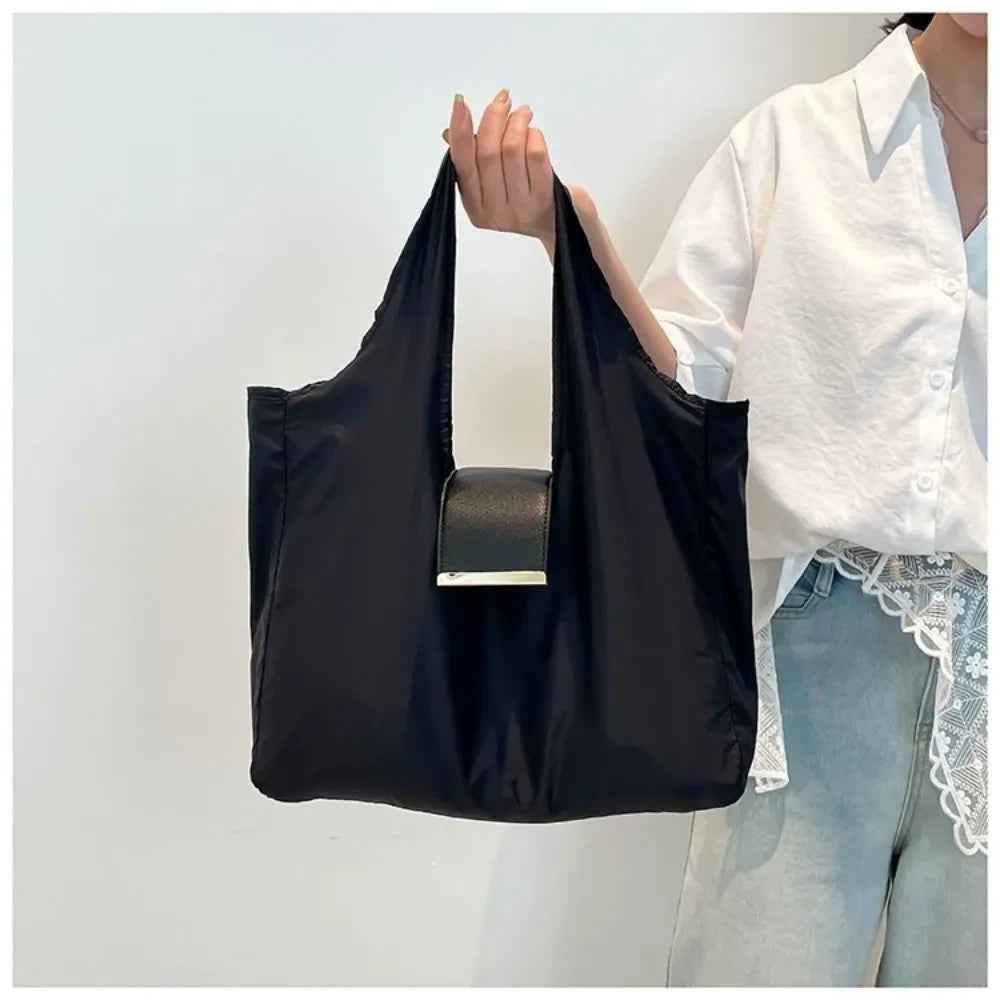 Bolsa de compras plegable con llavero